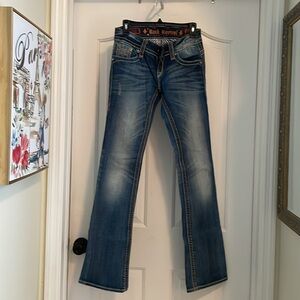 Rock Revival Boot cut jeans rhinestone flap pockets